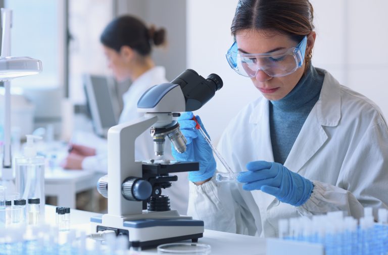 Young,Female,Student,In,The,Research,Lab,,She,Is,Examining
