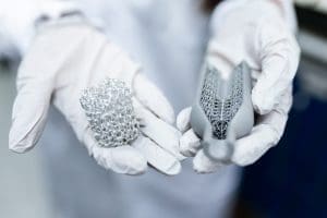 Image of Chemical Engineer holding materials