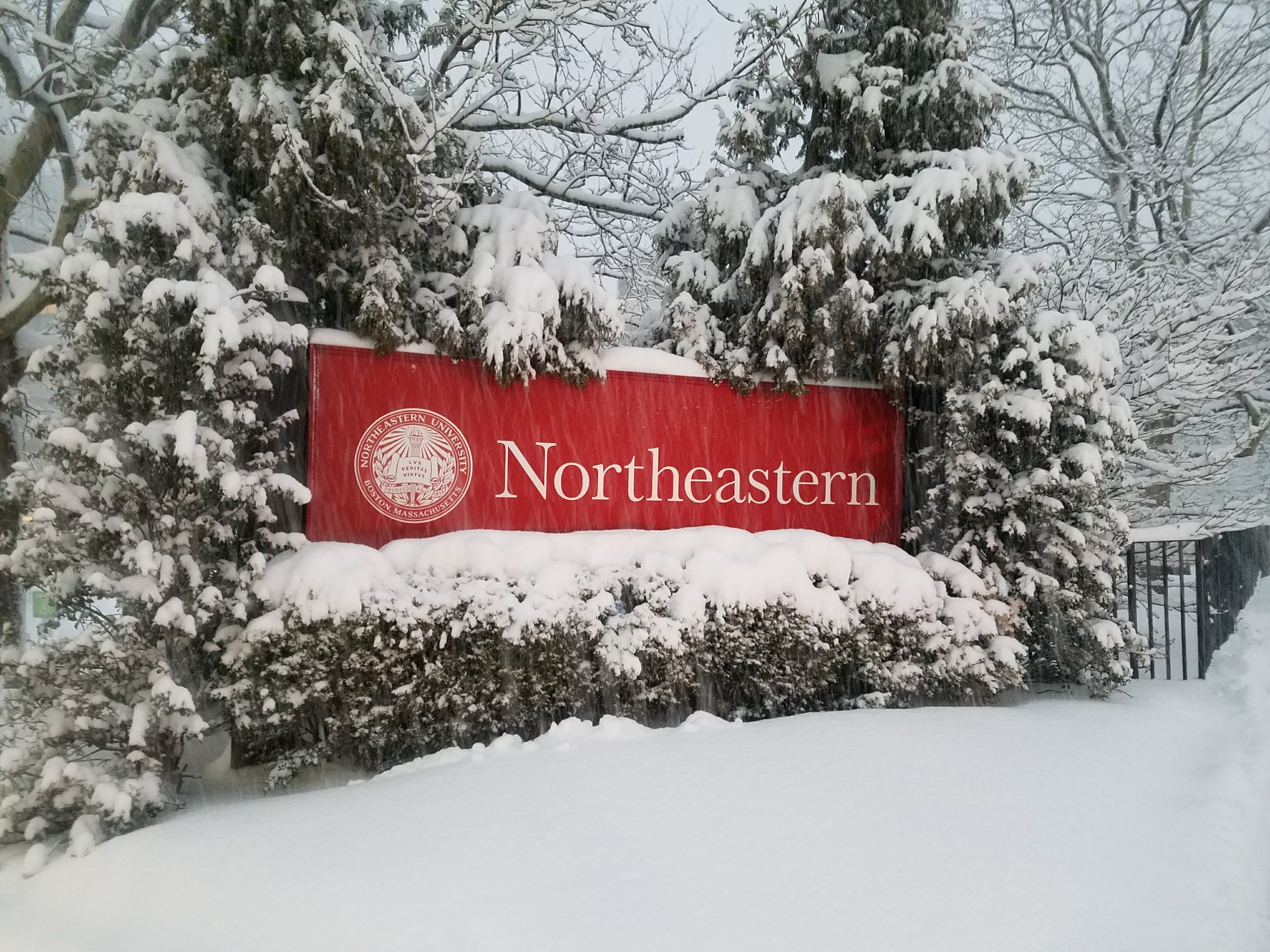 Northeastern University sign in snow