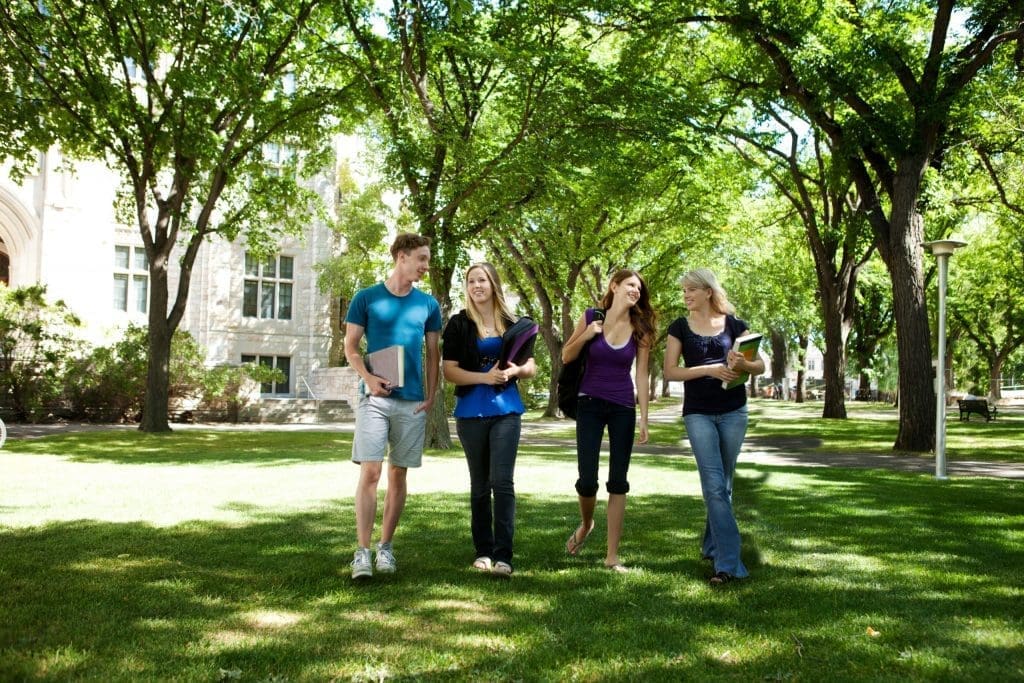 students walking through campus