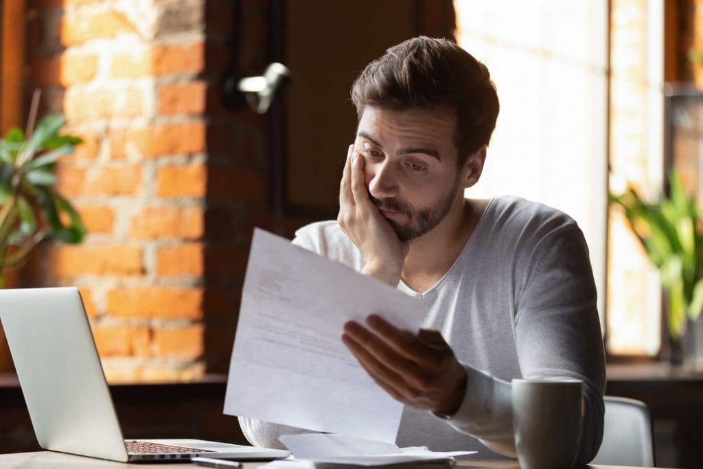 man reading a letter