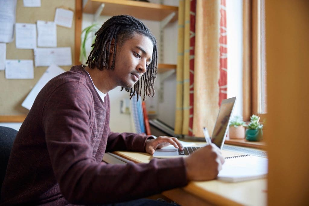 college student studying in dorm