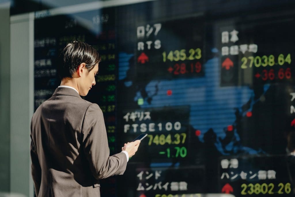 man looking at the market conditions