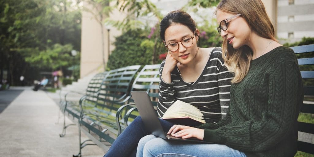 women studying and working outside