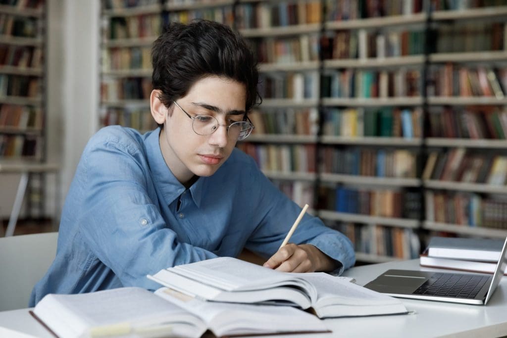 student working in library