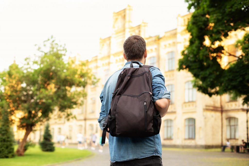 student walking on campus