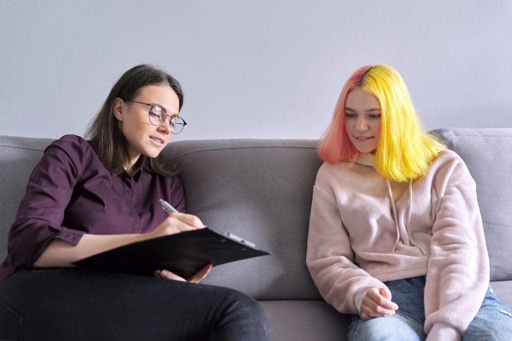 psychologist meeting with student