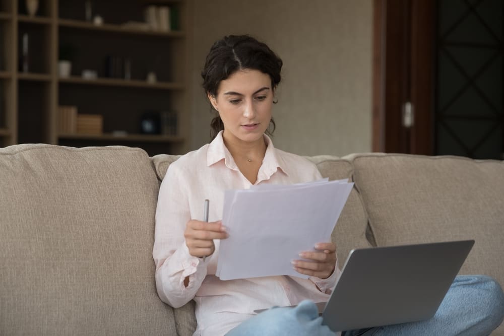 student analyzing papers