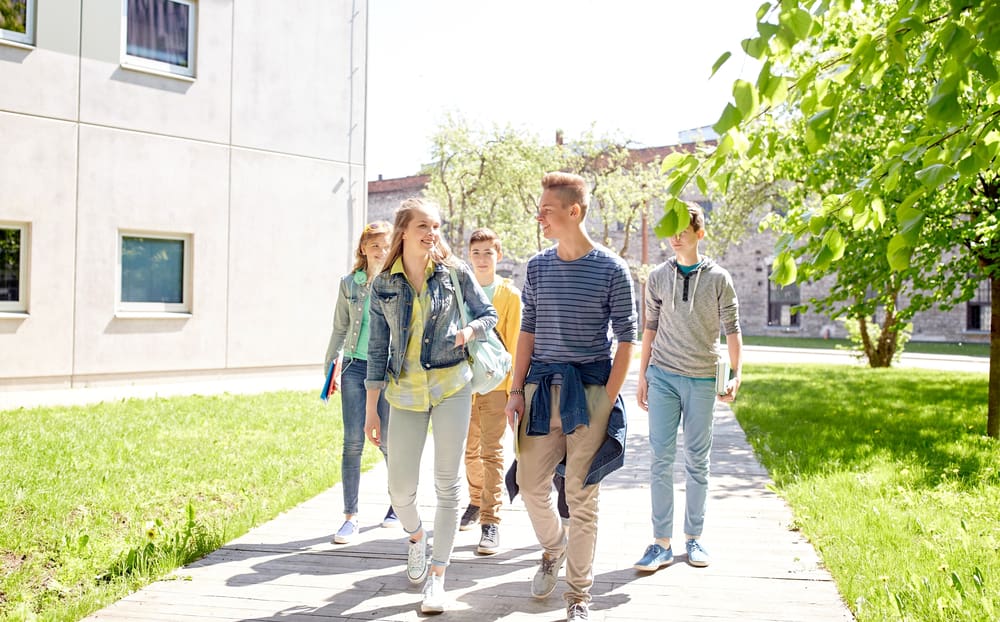 students walking on highschool campus