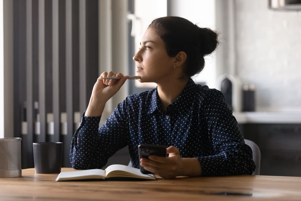 student studying with iphone