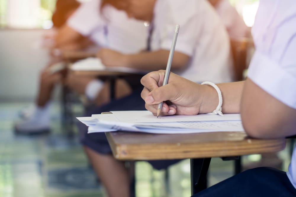 students doing an exam in class