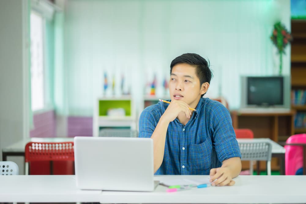person thinking and working
