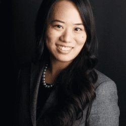 Portrait image of Kate, smiling at the camera.