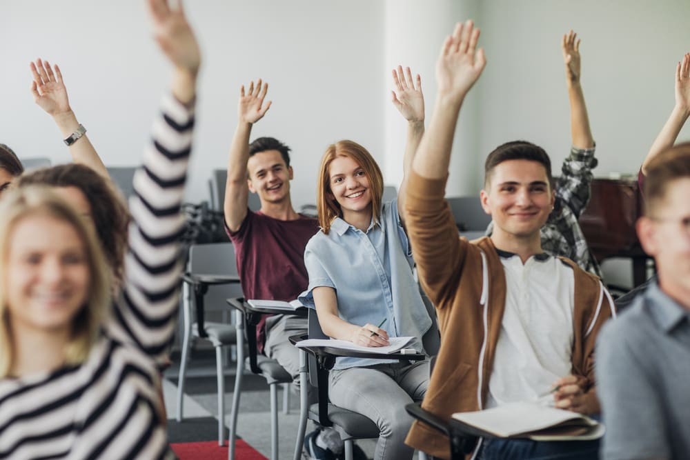 Students raising hands