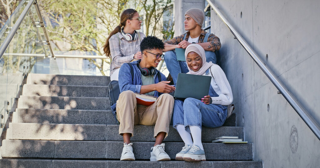 Group of high school students relaxed about their early action deadlines