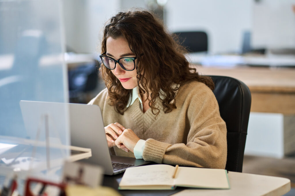 Student researcher in high school uses digital tools to find new resources