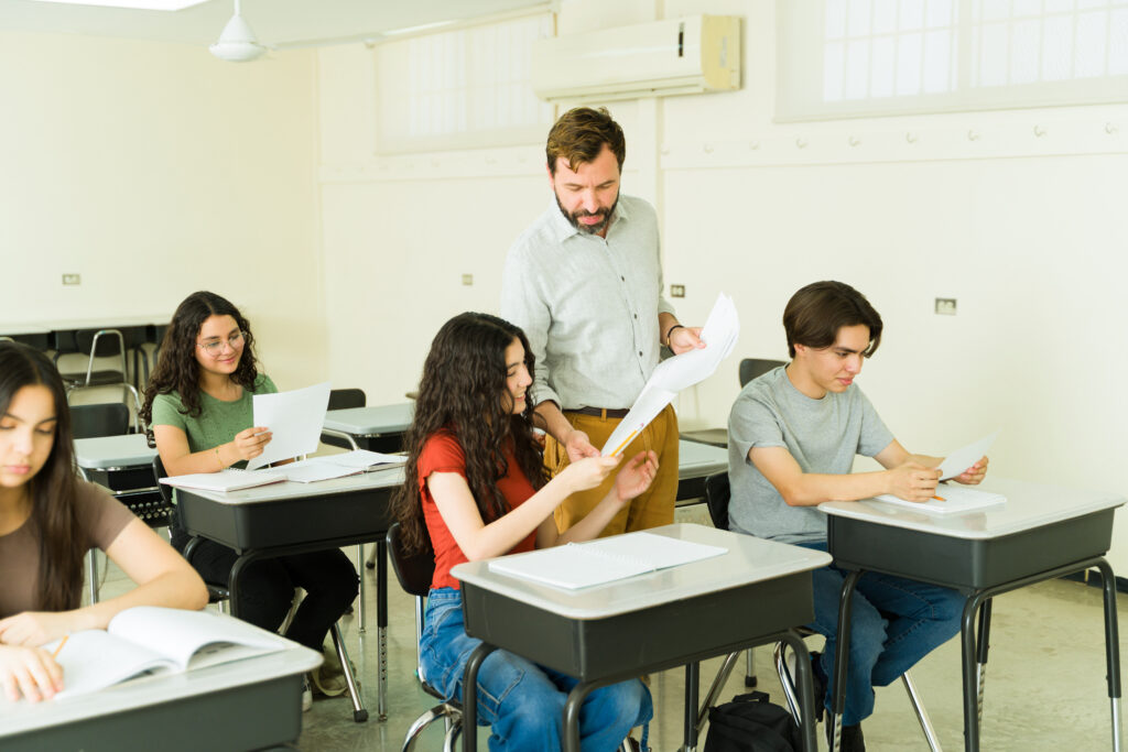Student working to improve junior year GPA in class