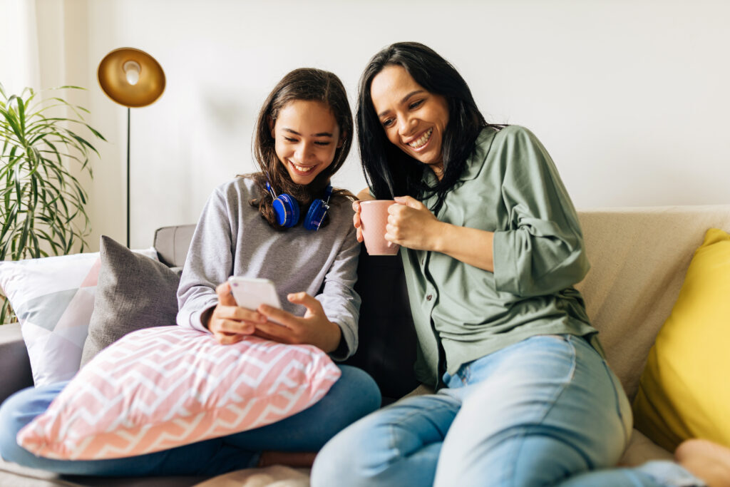 Mom and daughter discussing college admissions plans