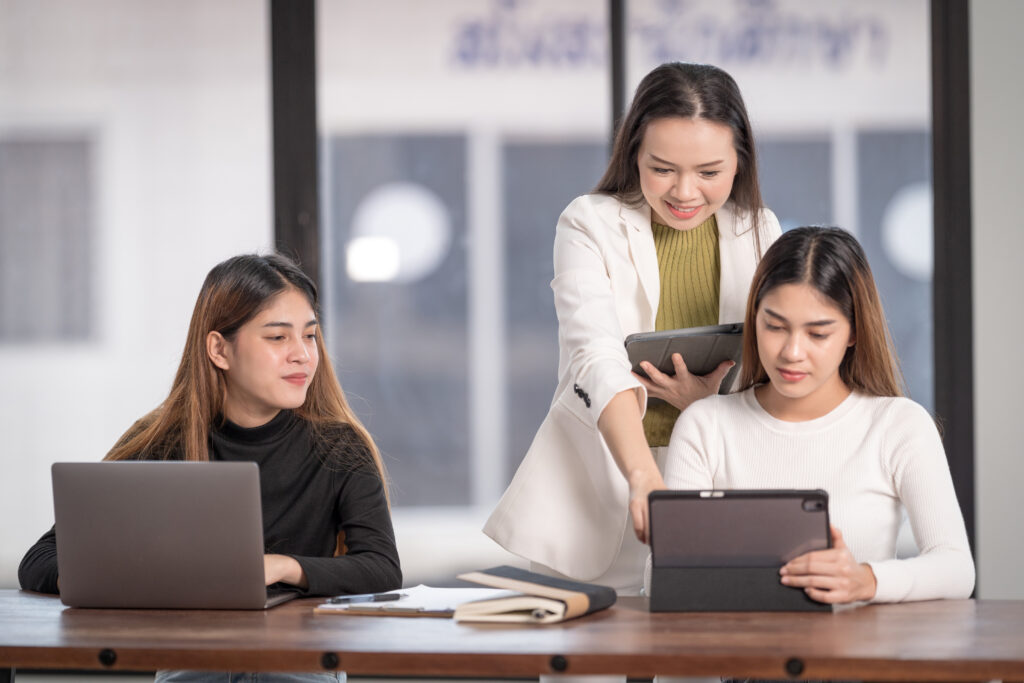 High school students consulting with a college advisor